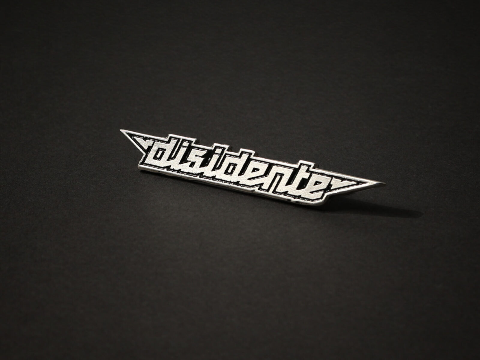 Disidente Pin Logo